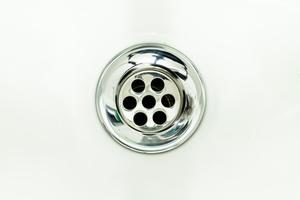 Up-close image of bathtub drain.