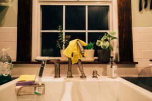 double sided sink in front of window