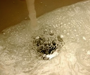 Clogged bathroom sink in Philadelphia home draining very slowly.