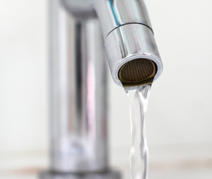 Running faucet with low water pressure in a Northern VA home.